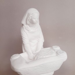 Panadera amasando pan