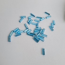 Abalorio Canutillo Azul turquesa 6 mm. Detalle rocalla