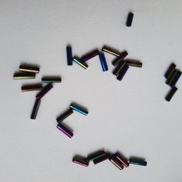 Abalorio Canutillo multicolor 6 mm. Detalle rocalla