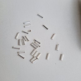 Abalorio Canutillo color blanco perla 6 mm. Detalle rocalla